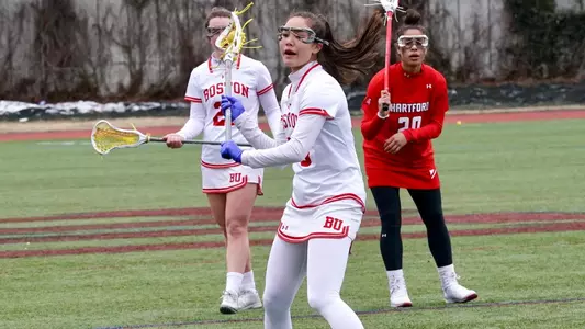 Cameron Nagao about to pass the ball