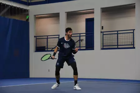 Sam Feit pumps his fist after a point