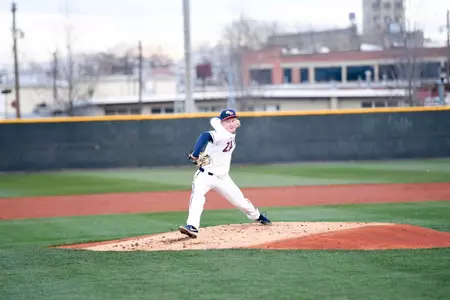 Mason Wells delivers a pitch
