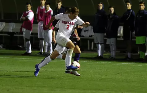 Cole Rovegno dribbles past defense