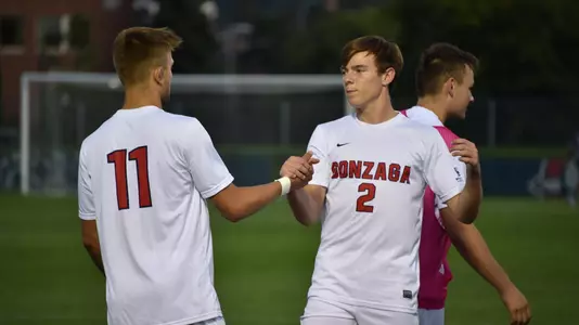 Cole Rovegno and Frankie Ljucovic shake hands