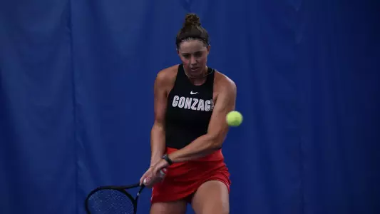 Taylor Gruber hits a backhand