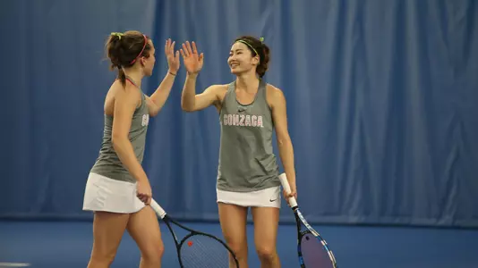 Maria Frampton and Haruna Tsuruta high five