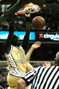 Pops Mensah-Bonsu dunks against Michigan State during the second half of a game in the BB and T Classic Saturday.