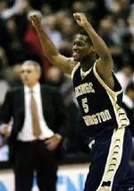 George Washington's T.J. Thompson celebrates GW's 101-92 upset win over Maryland.