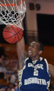 J.R. Pinnock dunks the ball on a fast break against Duquesne in the first half in Pittsburgh.
