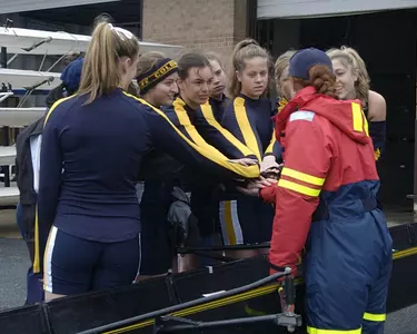 The GW women's varsity eight came together to win the final at Saturday's GW Invitational Crew Classic on the Potomac.