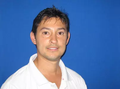 Greg Munoz is the new head coach for men's tennis at GW.