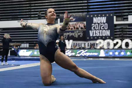 Karpova competes on floor.
