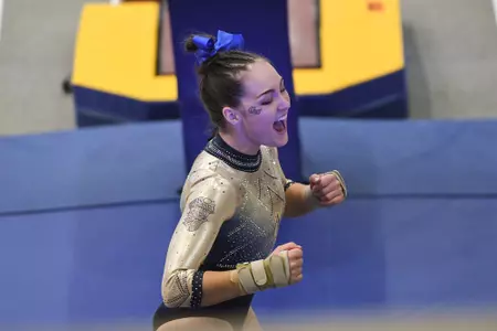 Munnelly celebrates after vault.
