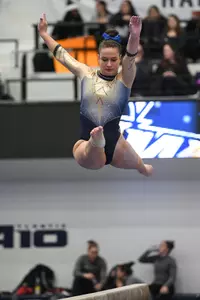 Karpova competes on beam.