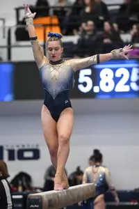Banen competes on beam.