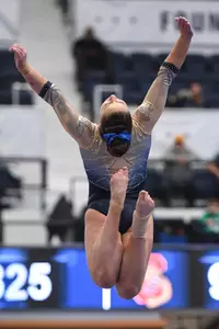 Karpova competes on beam.