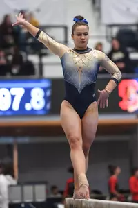 Karpova competes on beam.