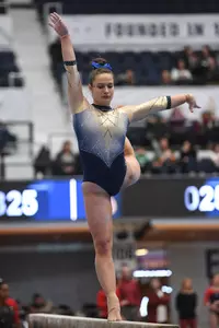 Karpova competes on beam.