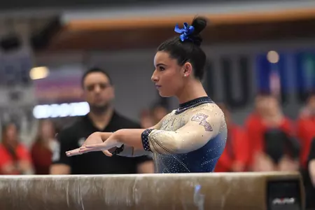 Crasa competes on beam.