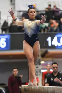 Crasa competes on beam.