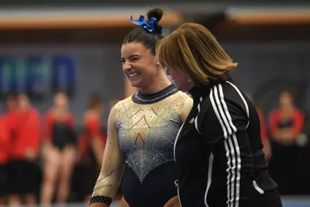 Crasa competes on beam.