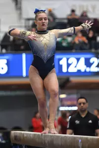 Banen competes on beam.