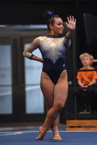 Kaplan competes on floor.