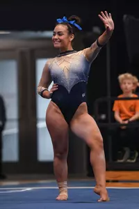 Kaplan competes on floor.