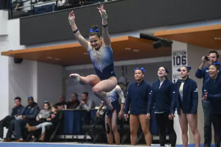 Karpova competes on floor.