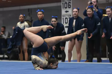 Karpova competes on floor.