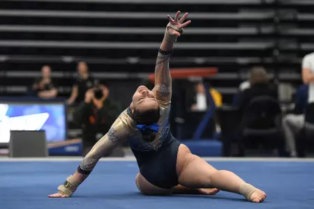 Karpova competes on floor.