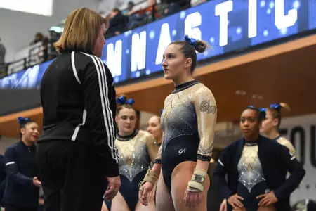 Banen prepares to complete on floor.