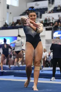 Crasa competes on floor.