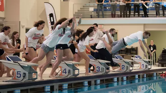 GW women's swimming and diving celebrates its championship.