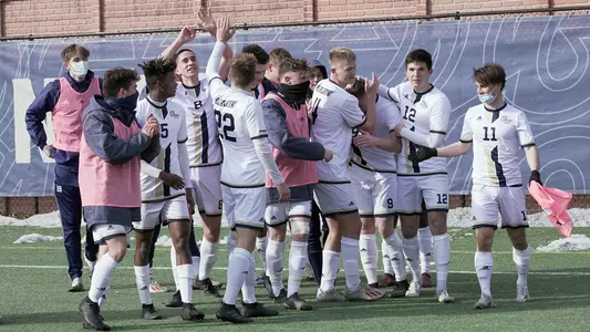 GW Men's Soccer celebrates its 1-0 win over Mount St. Mary's.