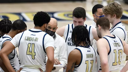 Head Coach Jamion Christian talks to his team.