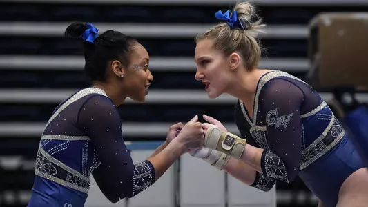Simone Banen and Deja Chambliss fist bump at Lindsey Ferris Invitational