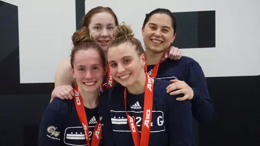 Julia Knox, Molly Smyers, Carly Perri and Erin McCarthy pose with their silver medals after the women's 800 free relay.