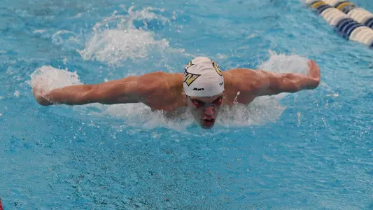 Djurdje Matic swims at the A-10 Championships.