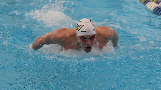 Djurdje Matic swims at the A-10 Championships.