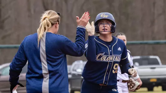 Maddy Dwyer celebrates a home run at St. Bonaventure.
