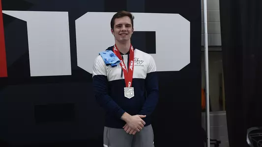 Spencer Bystrom poses with his A-10 silver medal.