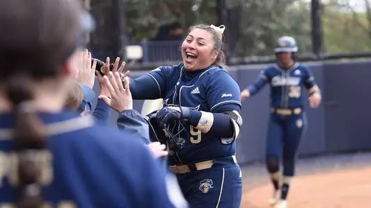 Alessandra Ponce celebrates a home run vs. George Mason.