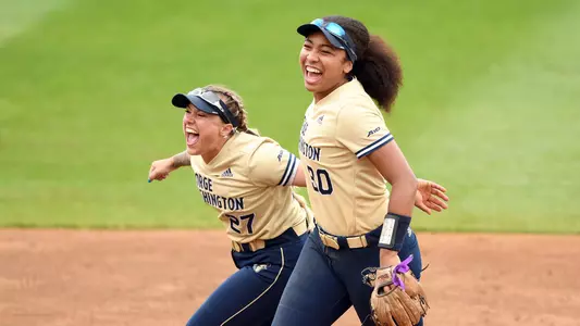 Hannah Eslick & Mia Psrker celebrate a win vs. Fordham at the A-10 Championship.