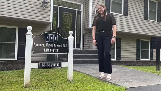 Taylor Puig poses at her summer internship in July 2022.