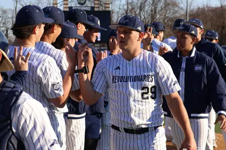 Michael Foltz Jr. Gives High-Fives After Win Over Maine