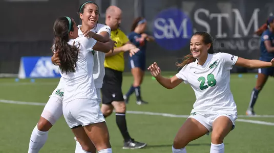 Women's soccer celebrate