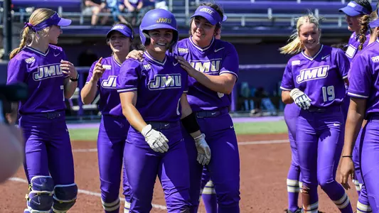 Bella Henzler smiling with JMU softball