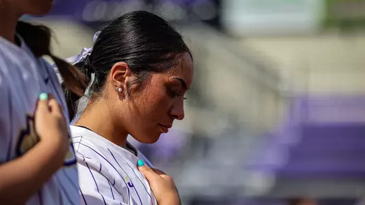 Kira Ortega posing for the anthem