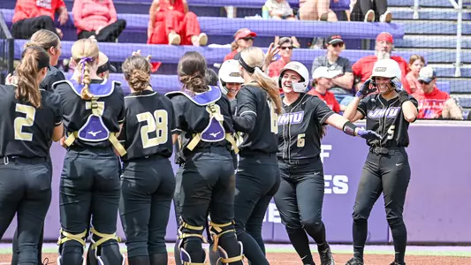 Lili Smith celebrating a home run