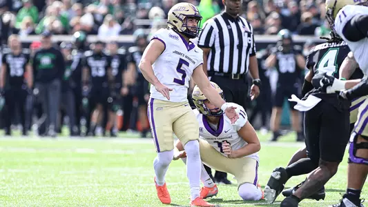 Morgan Suarez kicks a field goal at Marshall