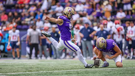 Morgan Suarez kicks a field goal against Liberty