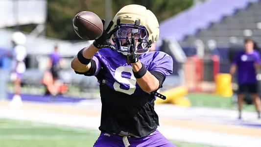 Davi Belfort makes a catch during a JMU football practice